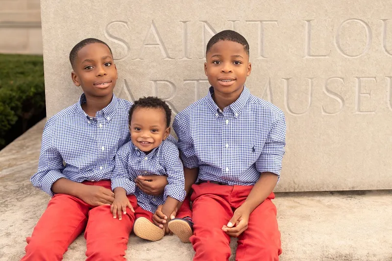 photo of 3 young boys